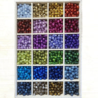 1014 - Glitter olivine - Perles Polaris rondes 10mm