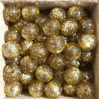 1002- Glitter doré - Perles Polaris rondes 10mm